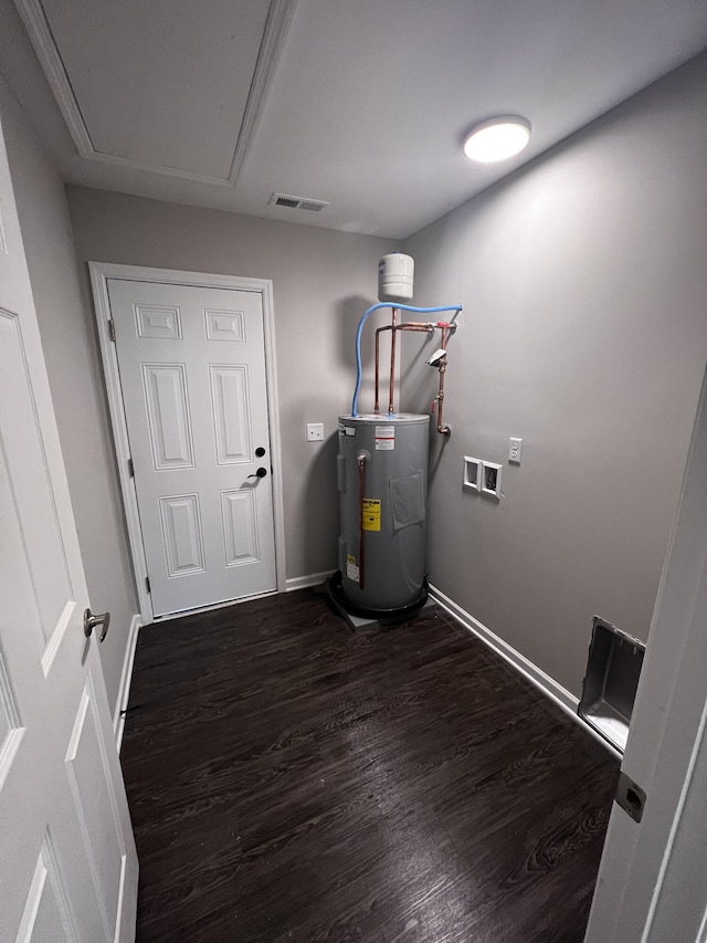 utilities featuring visible vents and electric water heater