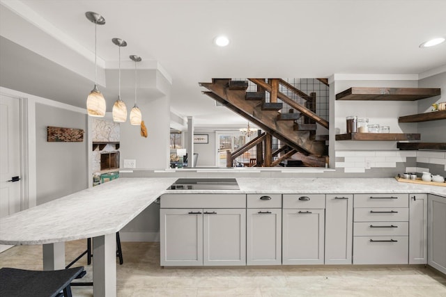 kitchen featuring gray cabinetry, open shelves, backsplash, crown molding, and black electric cooktop