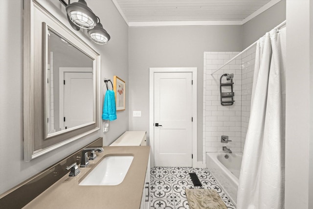 bathroom featuring tile patterned flooring, crown molding, vanity, and shower / tub combo with curtain