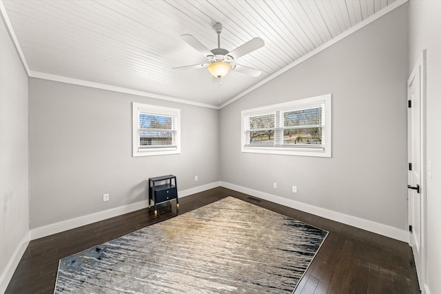 home office featuring baseboards, lofted ceiling, ornamental molding, and dark wood-style flooring