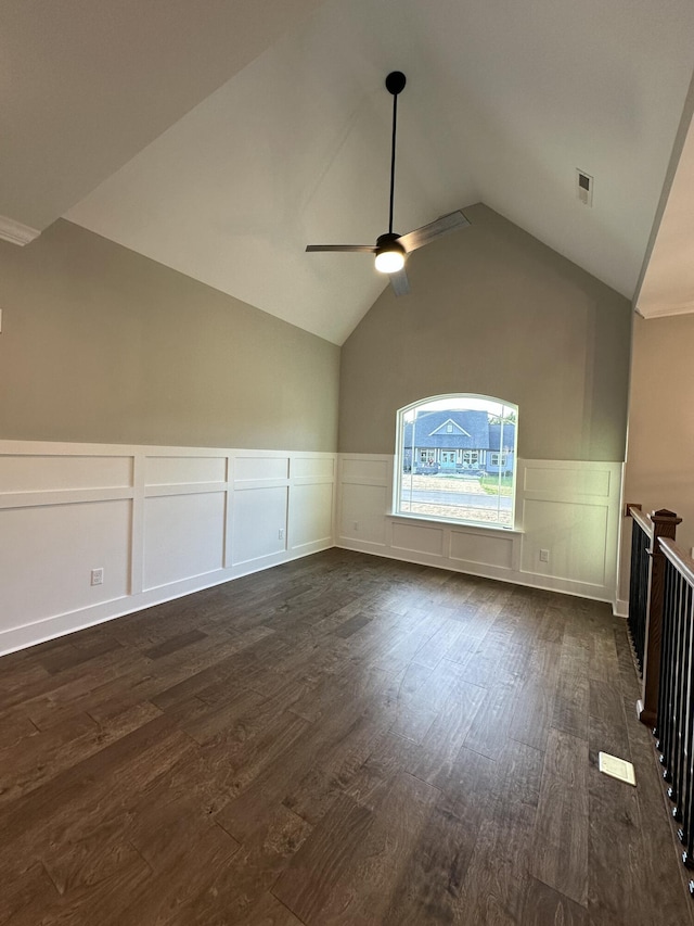 bonus room featuring visible vents, dark wood-type flooring, ceiling fan, and vaulted ceiling