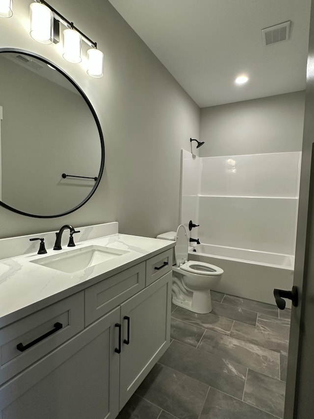 full bath featuring vanity, toilet, tub / shower combination, and visible vents