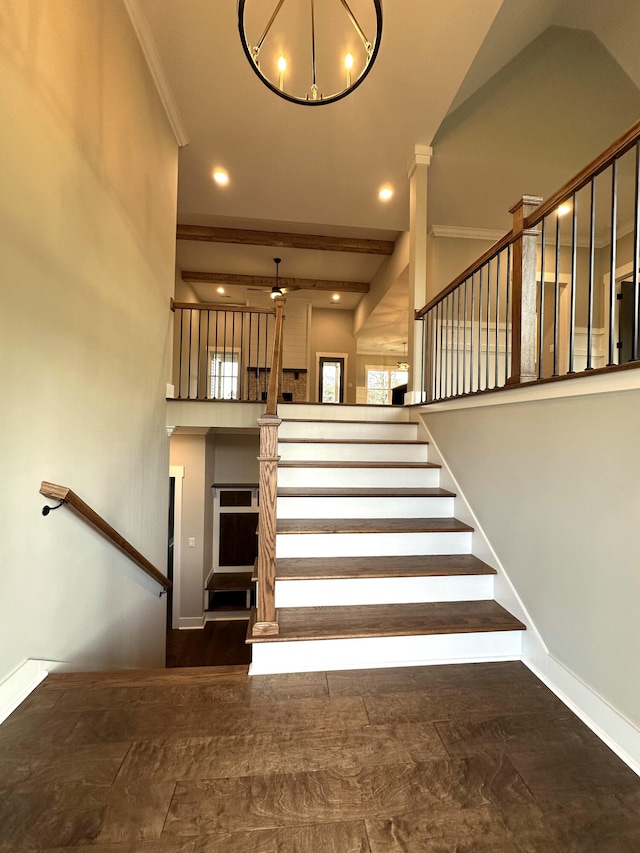 staircase featuring recessed lighting, baseboards, and crown molding