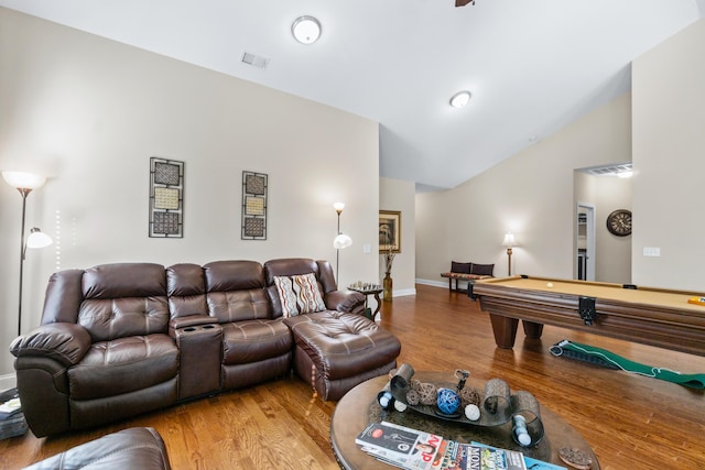 living room with vaulted ceiling, billiards, wood finished floors, and visible vents