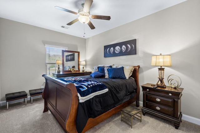 bedroom featuring visible vents, baseboards, a ceiling fan, and carpet flooring