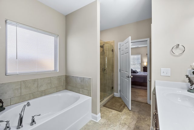 bathroom with connected bathroom, a stall shower, vanity, and a garden tub