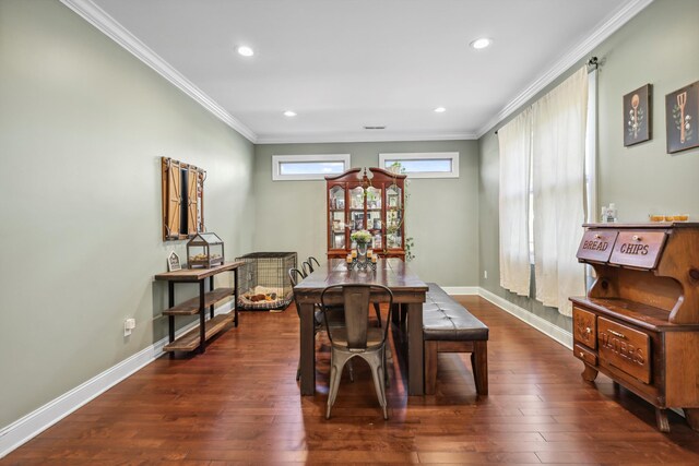 524 Ladd Ave, Chattanooga, TN 37405 - dining area featuring baseboards, dark wood-type flooring, and crown molding