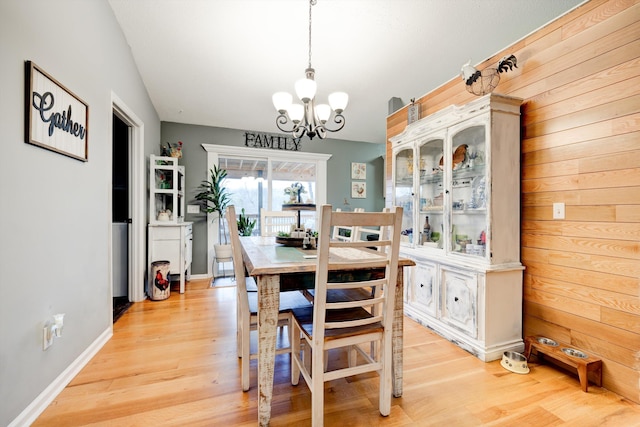 186 Joann Dr SE, Calhoun, GA 30701 - dining area with an inviting chandelier, baseboards, and light wood finished floors