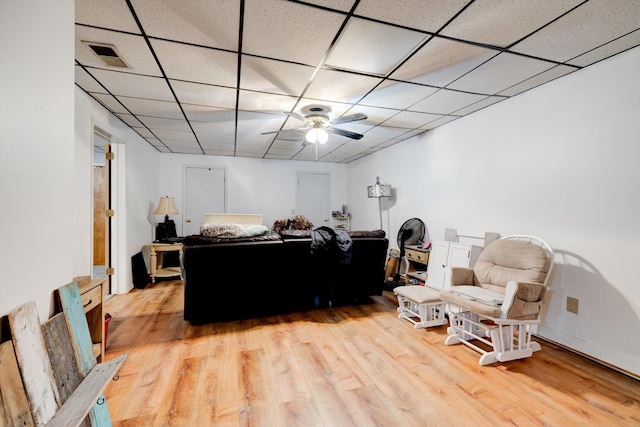 186 Joann Dr SE, Calhoun, GA 30701 - living room with visible vents, a ceiling fan, light wood-type flooring, and a drop ceiling