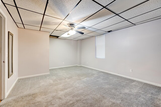 186 Joann Dr SE, Calhoun, GA 30701 - below grade area featuring a paneled ceiling, baseboards, and carpet floors