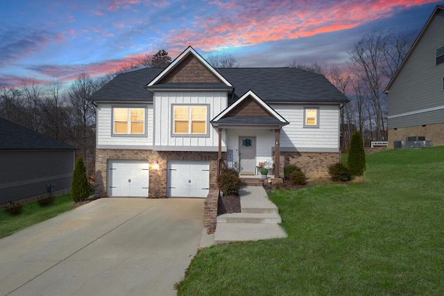 view of front of home with concrete driveway, an attached garage, brick siding, and a lawn