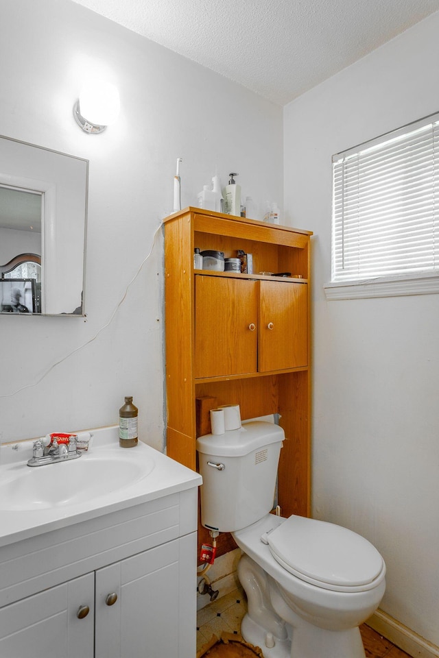 2011 Robbins St, Chattanooga, TN 37404 - bathroom featuring toilet, a textured ceiling, and vanity