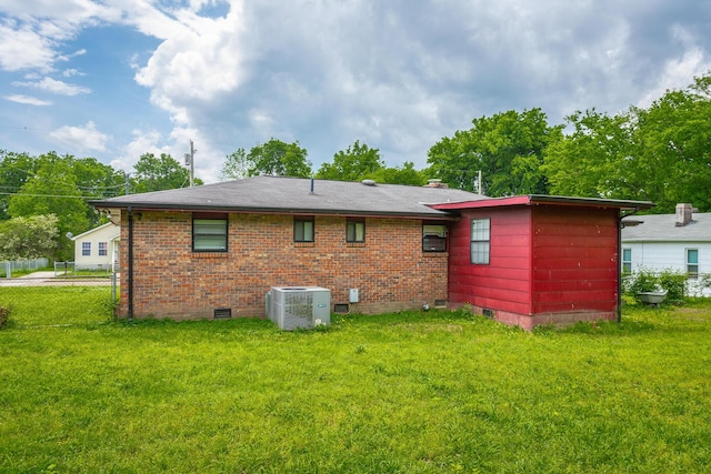 2011 Robbins St, Chattanooga, TN 37404 - back of house with brick siding, central AC unit, a yard, and crawl space