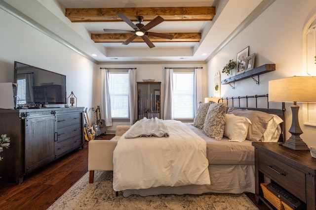 bedroom featuring beam ceiling and dark wood finished floors