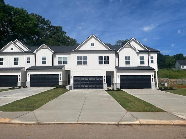 11305 Cape Vw Unit 15, Soddy Daisy, TN 37379 - view of front of home featuring a garage, board and batten siding, and driveway