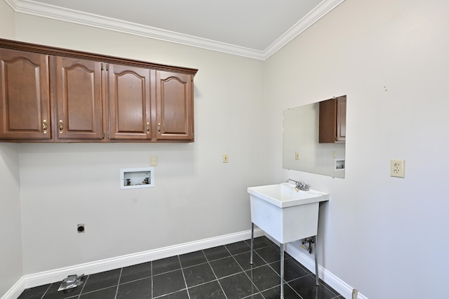 clothes washing area with cabinet space, baseboards, electric dryer hookup, and washer hookup