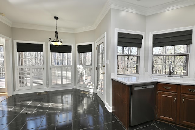 kitchen featuring baseboards, decorative light fixtures, dishwasher, a sink, and granite finish floor