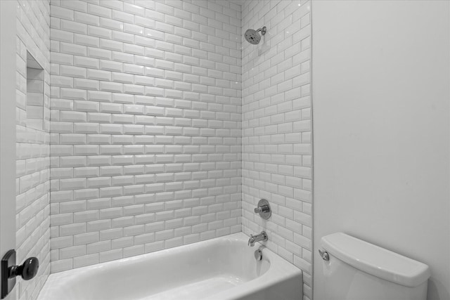 full bath featuring  shower combination and toilet