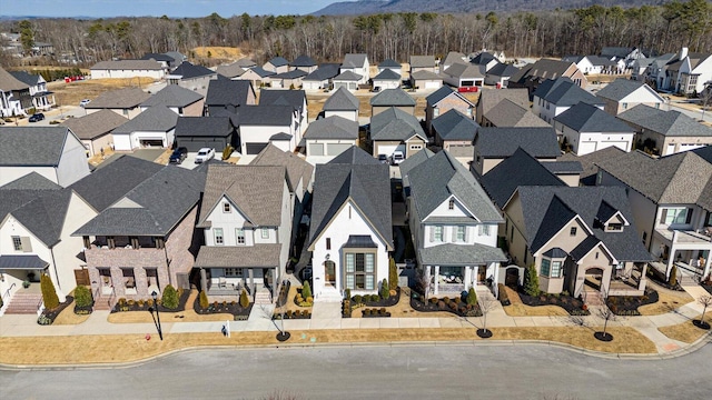 aerial view with a mountain view and a residential view