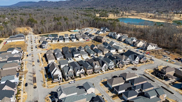 aerial view featuring a water view and a residential view