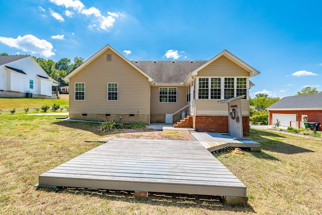 rear view of house with entry steps, a wooden deck, a yard, and crawl space