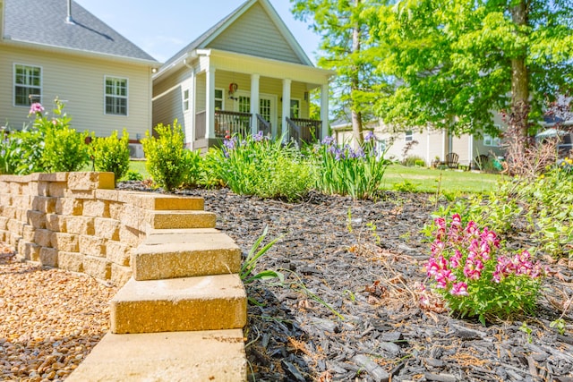 view of front of property featuring covered porch