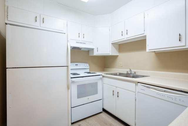 900 Mountain Creek Rd # 363, Chattanooga, TN 37405 - kitchen featuring under cabinet range hood, light countertops, white appliances, white cabinetry, and a sink