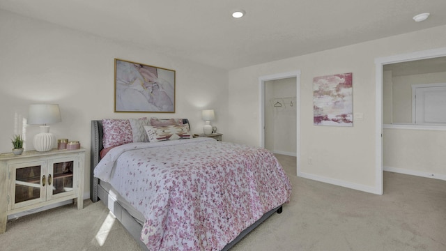bedroom featuring baseboards and carpet floors