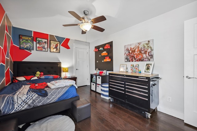 bedroom featuring wood-type flooring, baseboards, and ceiling fan