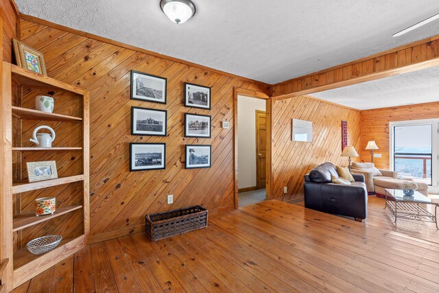 2345 County Rd 865, Gaylesville, AL 35973 - interior space with wood-type flooring and a textured ceiling