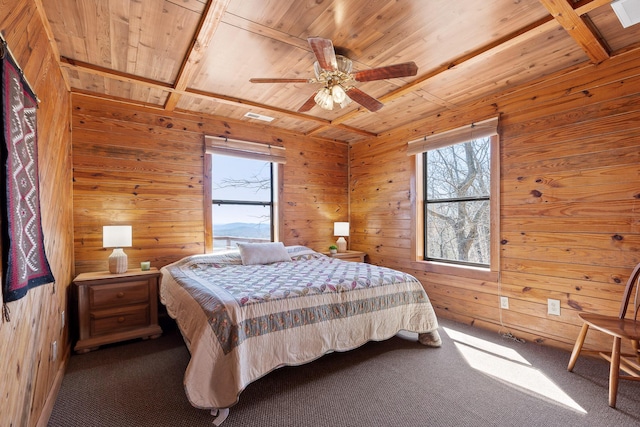 2345 County Rd 865, Gaylesville, AL 35973 - carpeted bedroom featuring wood walls, wood ceiling, and multiple windows