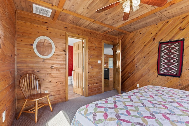 2345 County Rd 865, Gaylesville, AL 35973 - bedroom with visible vents, carpet, wood walls, beam ceiling, and wooden ceiling
