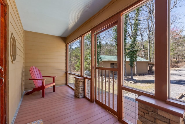2345 County Rd 865, Gaylesville, AL 35973 - unfurnished sunroom with hardwood / wood-style floors and wood walls