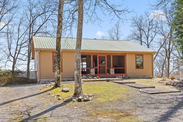 2345 County Rd 865, Gaylesville, AL 35973 - view of front of house with metal roof, a porch, and fence