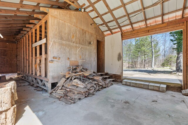 2345 County Rd 865, Gaylesville, AL 35973 - miscellaneous room with high vaulted ceiling and concrete floors
