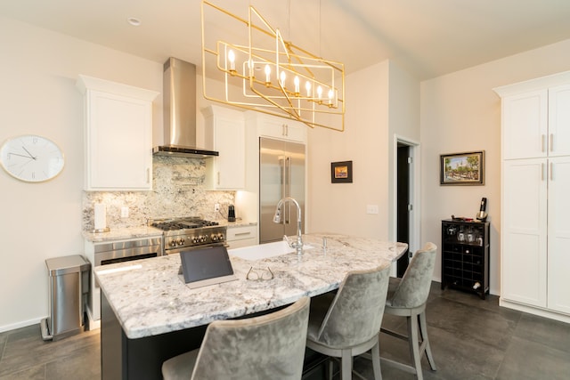295 W 19th St, Chattanooga, TN 37408 - kitchen with a sink, white cabinetry, appliances with stainless steel finishes, wall chimney range hood, and decorative backsplash