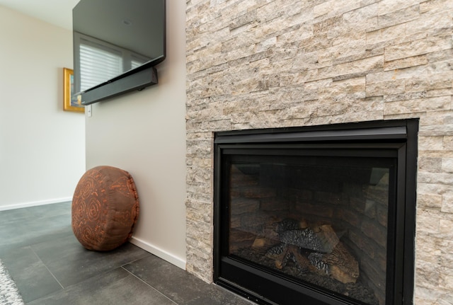 295 W 19th St, Chattanooga, TN 37408 - interior details featuring a stone fireplace and baseboards