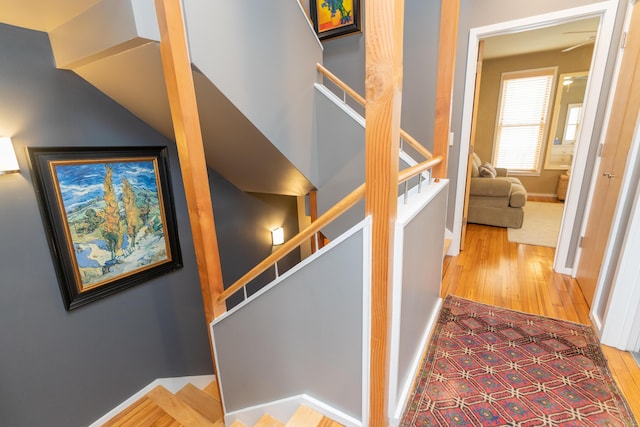 295 W 19th St, Chattanooga, TN 37408 - corridor with stairs, wood finished floors, and baseboards
