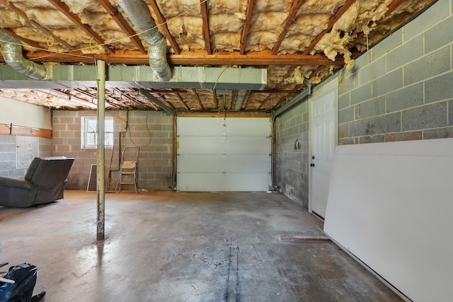 garage featuring concrete block wall