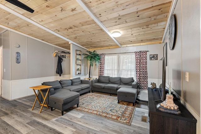 105 Massingale Rd, Tellico Plains, TN 37385 - living room with visible vents, wooden ceiling, wood finished floors, and wainscoting
