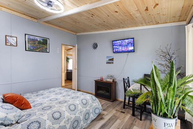 105 Massingale Rd, Tellico Plains, TN 37385 - bedroom featuring wood finished floors, baseboards, visible vents, and wooden ceiling
