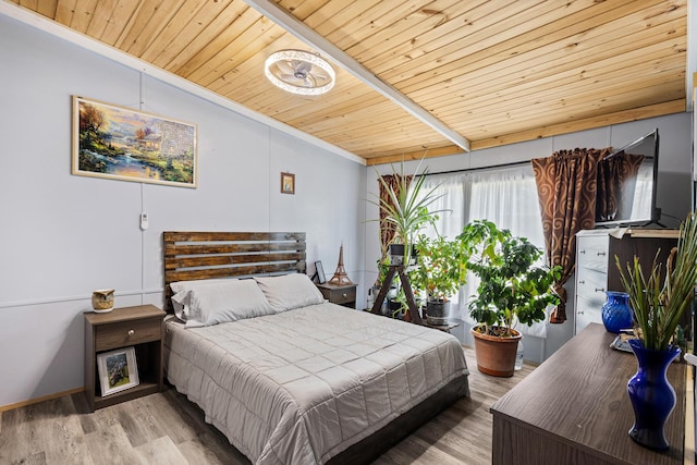 105 Massingale Rd, Tellico Plains, TN 37385 - bedroom featuring crown molding, wooden ceiling, wood finished floors, and lofted ceiling