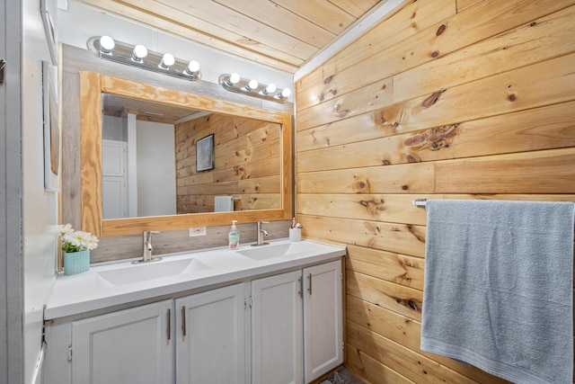 105 Massingale Rd, Tellico Plains, TN 37385 - bathroom with wooden walls, double vanity, a sink, and wooden ceiling
