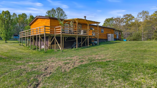 105 Massingale Rd, Tellico Plains, TN 37385 - back of property featuring a lawn and a deck