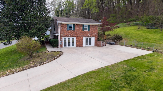 7004 Lystra Rd, Harrison, TN 37341 - view of front of home with french doors and brick siding
