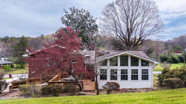 7004 Lystra Rd, Harrison, TN 37341 - back of property with a wooden deck and a yard