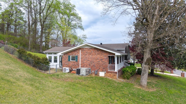 7004 Lystra Rd, Harrison, TN 37341 - view of side of property with brick siding and a fenced backyard