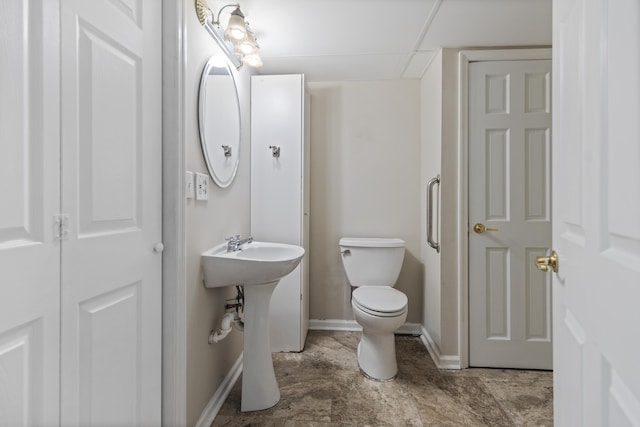 7004 Lystra Rd, Harrison, TN 37341 - half bathroom featuring baseboards and toilet
