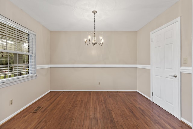 7004 Lystra Rd, Harrison, TN 37341 - unfurnished dining area featuring a chandelier and wood finished floors