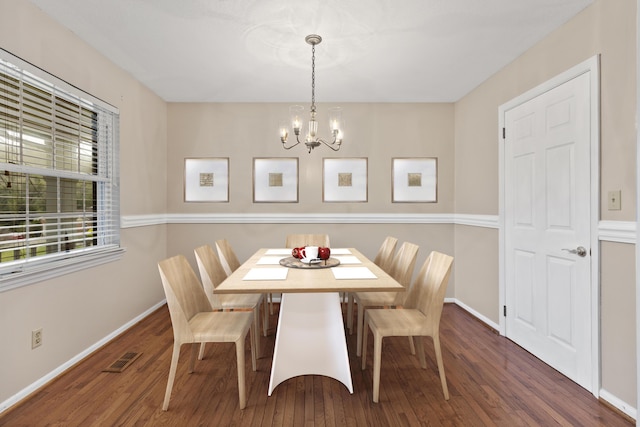 7004 Lystra Rd, Harrison, TN 37341 - dining room with a chandelier and wood finished floors